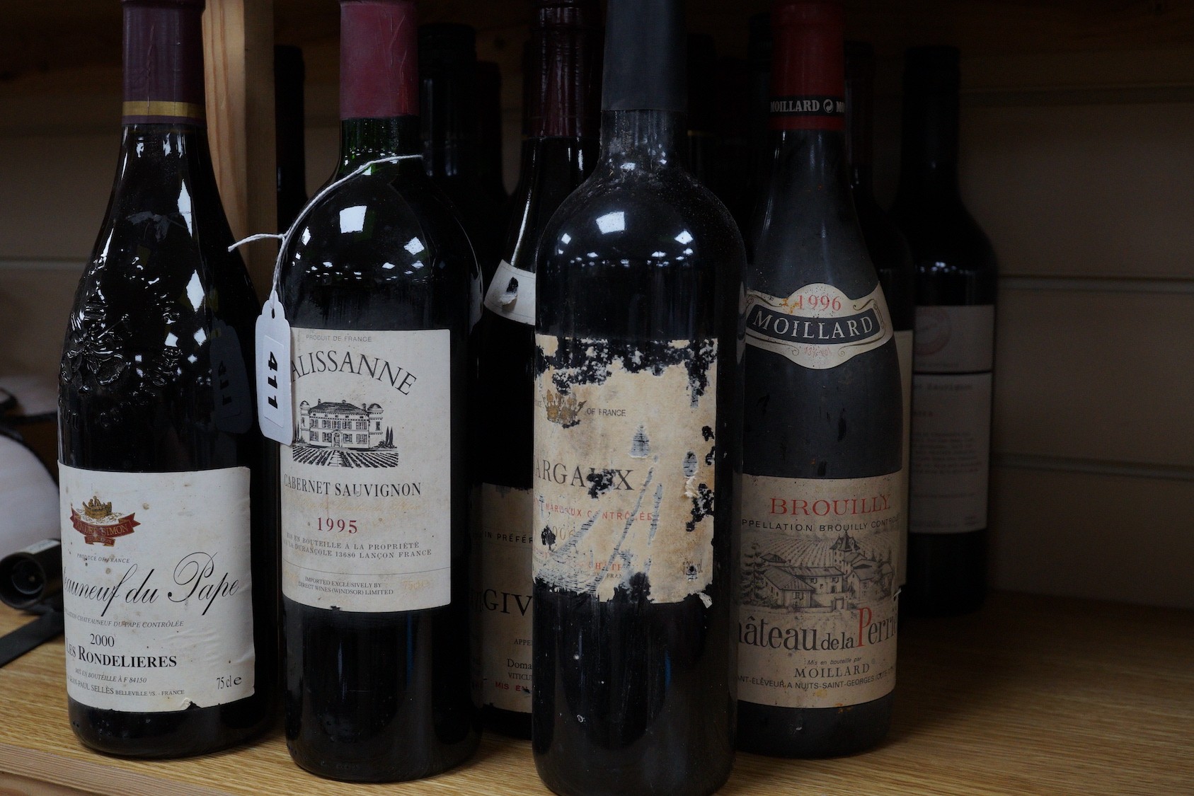 18 various bottles of wine including Calissanne Cabernet Sauvignon 1995, Brouilly Chateau de la Perriere 1996, Coonawarra Cabernet Sauvignon 2011, Chateauneuf du Pape 2000, etc.